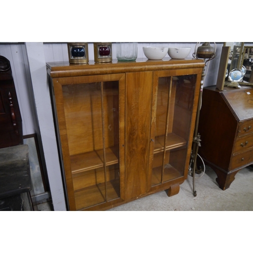 2129 - A 1940's walnut display cabinet