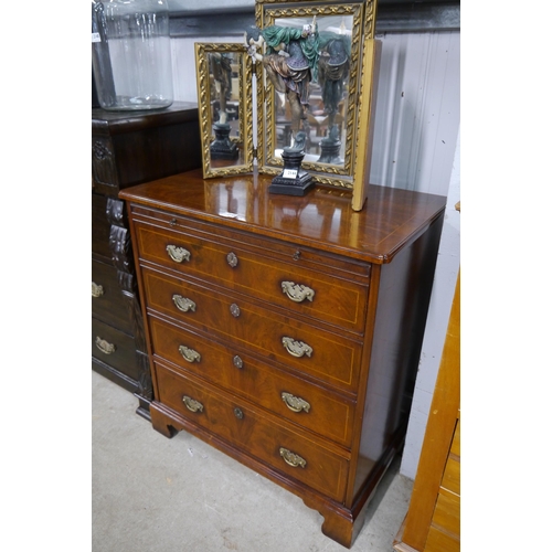 2145 - A Queene Anne style walnut TV cabinet with faux three drawer lift up front, drawer below