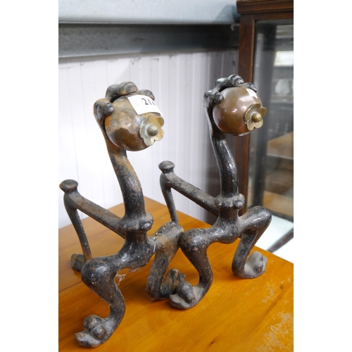 2149 - A pair of Victorian cast iron and brass fire dogs