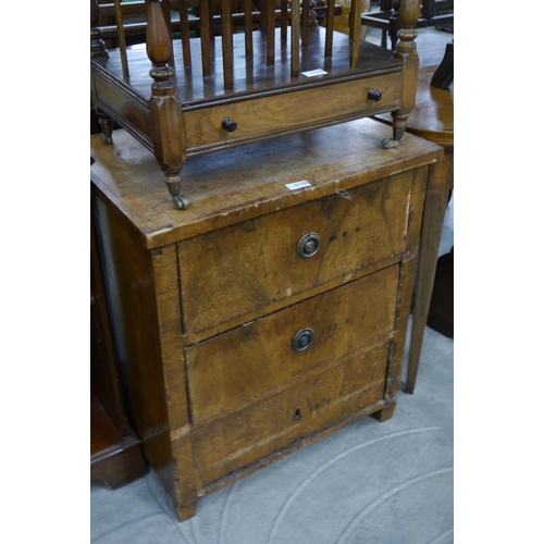 2179 - An early 19th Century Continental walnut three drawer bedside chest, a/f     (E) £5-10