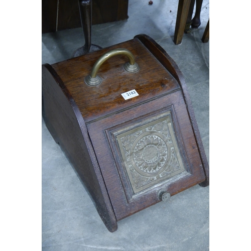 2182 - An Edwardian oak and brass coal box