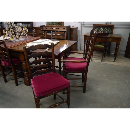 2186 - A set of 10 (8+2) country oak wavy ladder-back dining chairs, rush seated