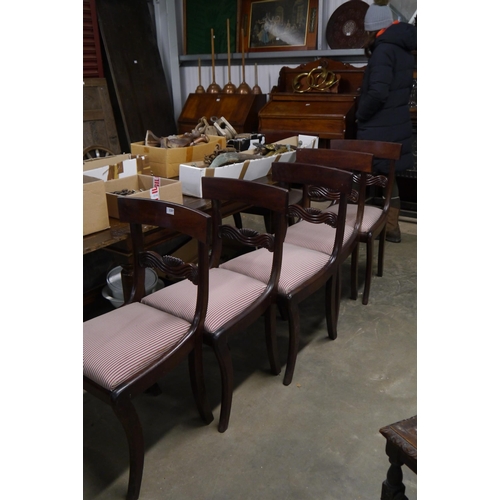 2207 - A set of six mahogany Regency chairs, drop-in seats, sabre front legs