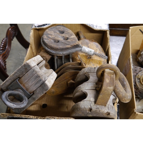 2212 - A box of bygone timber and iron pulleys