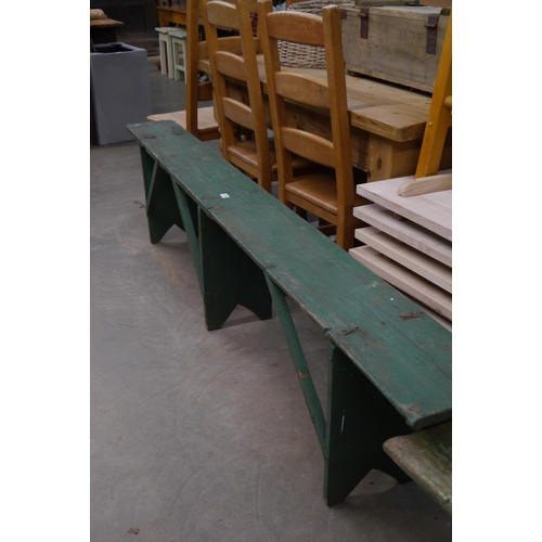 2282 - A large green painted pine bench 248cm long     (E) £15-20