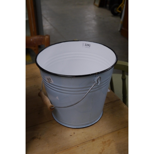 2292 - A pale blue enamel milking bucket