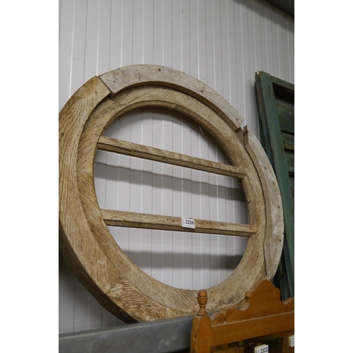 2320 - A circular oak window frame