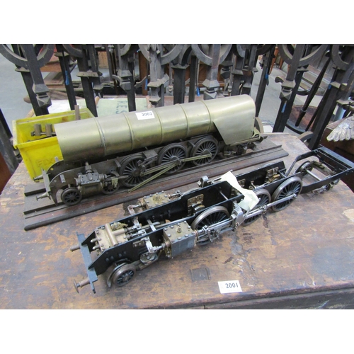 2002 - Two live steam locomotive engine frames, one with boiler