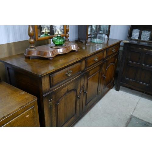 2153 - A Georgian style oak sideboard dresser base 169cm wide