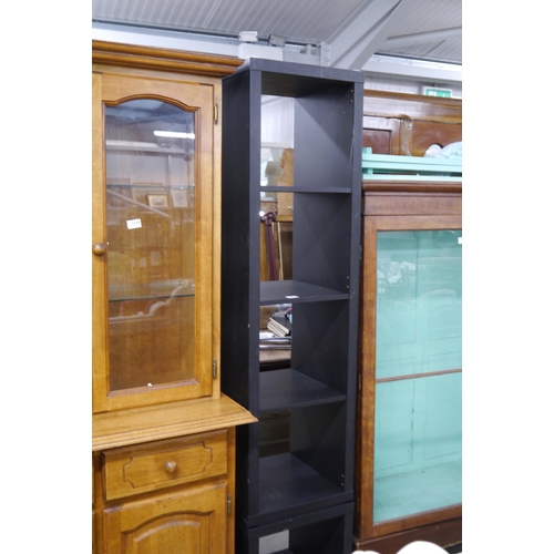 2346 - A 6' tall black painted wooden shelf unit