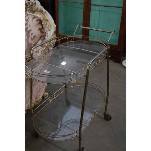 2349 - A mid 20th Century metal and glass drink trolley