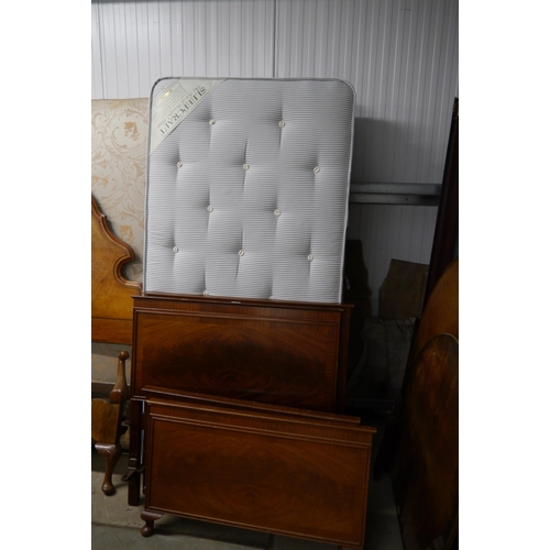 2369 - A pair of 1930's mahogany single beds with bases and one mattress