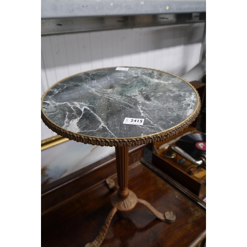 2415 - A French metal based occasional table with marble effect top