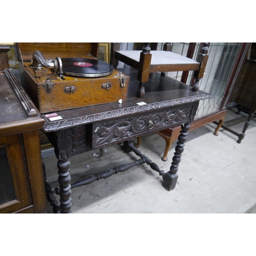 2417 - A Victorian oak Jacobean style hall table