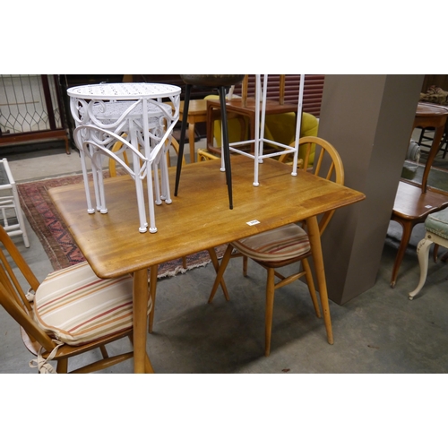 2434 - A 1960's Ercol elm top kitchen table with slatted undertier