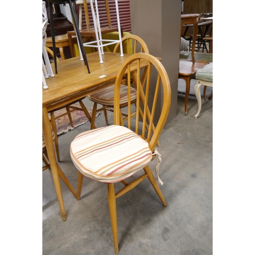 2435 - A set of four Ercol Windsor elm seated kitchen chairs, hoop stick back