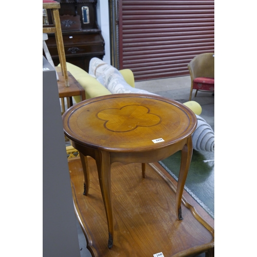 2439 - An inlaid circular occasional table with ormolu mounts