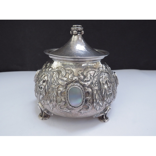 6439 - An Omar Ramsden and Alwyn Carr Arts and Crafts silver onion form inkwell with allover repousse decor... 