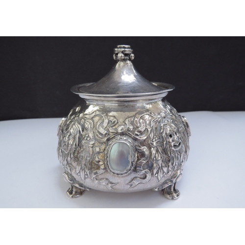 6439 - An Omar Ramsden and Alwyn Carr Arts and Crafts silver onion form inkwell with allover repousse decor... 