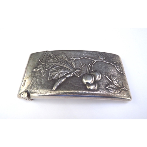 6432 - A silver card case of ergonomic form with repousse butterfly and cherries on a branch, Chester 1906,... 