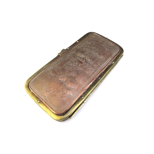 6436 - A 19th Century Grand Tour pouch/spectacle case having a brass frame with embossed copper panels to f... 