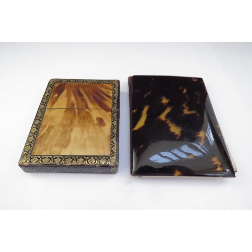 6455 - A tortoiseshell carved card case and another depicting a dragon with cream pocketed interior (2)