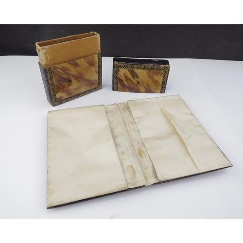 6455 - A tortoiseshell carved card case and another depicting a dragon with cream pocketed interior (2)