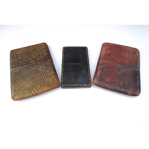 6467 - Five various card/cigar cases including leather and tooled examples and a beaded spectacle case