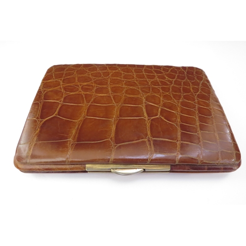 6446 - A leather crocodile skin effect wallet/card case with 9ct gold corner mounts, 13cm x 9cm