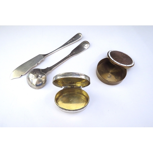 6447 - A silver salt spoon, silver butter knife, oval hinged patch pot, unmarked and a circular brass pill ... 