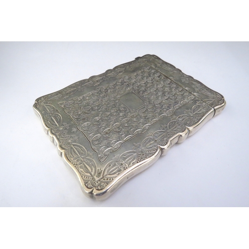 6430 - A silver card case, all over decoration vacant cartouche, Birmingham 1882, makers mark indistinct, i... 