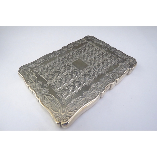 6430 - A silver card case, all over decoration vacant cartouche, Birmingham 1882, makers mark indistinct, i... 