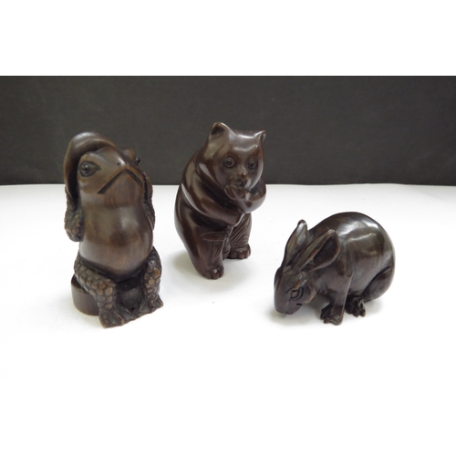 6411 - Three Meiji period (1868-1912) signed Japanese wood Netsukes, Toad, Rabbit and Panda bear 5, 4.5 and... 