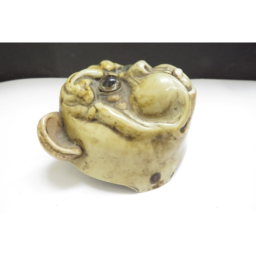 6385 - A 20th Century celluloid bulldog hotel bell, split