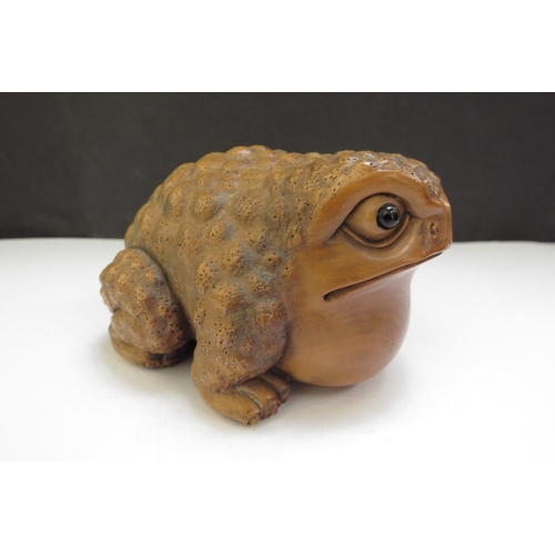 6383 - A Meiji period Japanese boxwood carved toad, 9.5cm long, 6cm tall