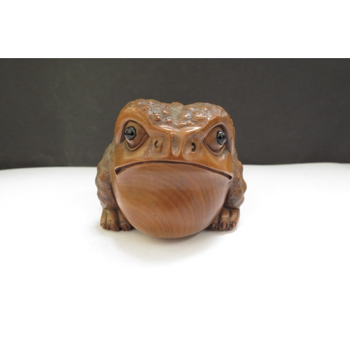 6383 - A Meiji period Japanese boxwood carved toad, 9.5cm long, 6cm tall