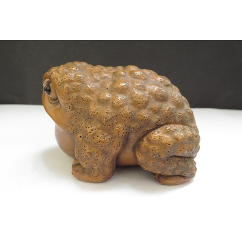 6383 - A Meiji period Japanese boxwood carved toad, 9.5cm long, 6cm tall