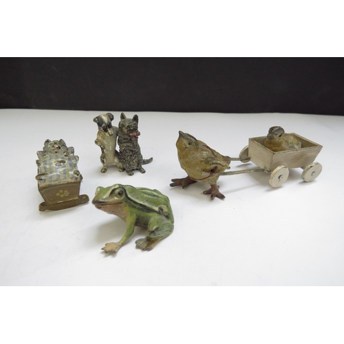 6387 - Four cold painted bronze miniature figures including chick, cat, frog and dog embracing