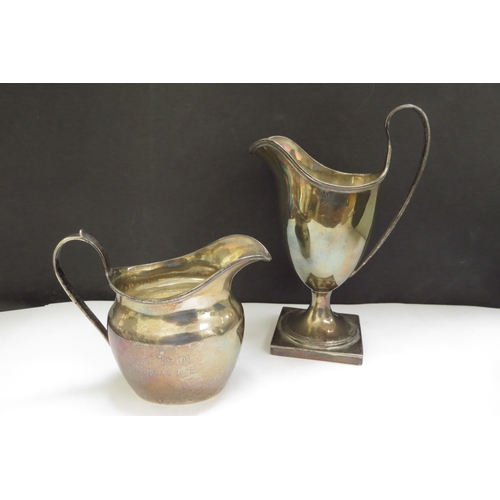 6403 - Two George Nathan & Ridley Hayes silver cream jugs, one of helmet form, Chester 1897, 16.5cm tall, 2... 