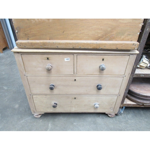 2056 - A Victorian stripped pine two short, over two long chest of drawers