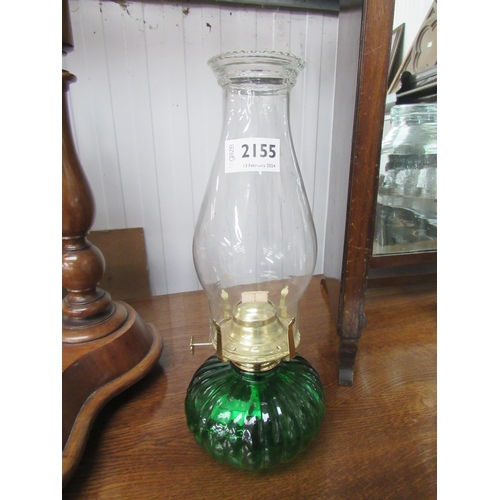 2155 - A small green glass oil lamp