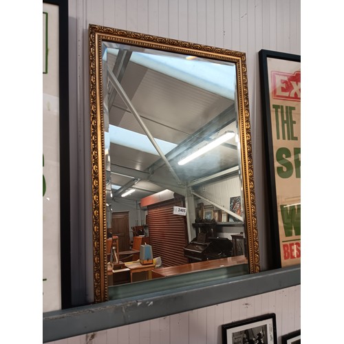 2405 - A modern gilt framed wall mirror