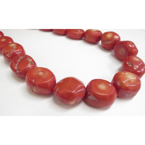 6413 - A coral necklace, each bead 2cm x 2cm approx, 46cm long  (C)