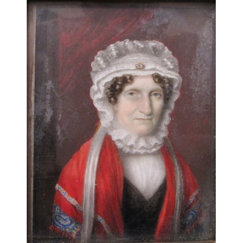 6085 - A 19th Century watercolour on ivory panel of a woman in white bonnet and red cloak. Unsigned. Set in... 