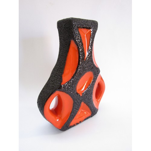 9133 - A Roth Keramik West German Fat Lava 'Guitar' vase in orange and black volcanic glazes. 30.5cm high