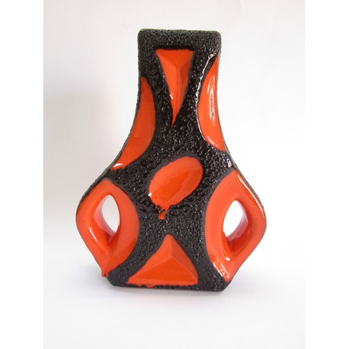 9133 - A Roth Keramik West German Fat Lava 'Guitar' vase in orange and black volcanic glazes. 30.5cm high