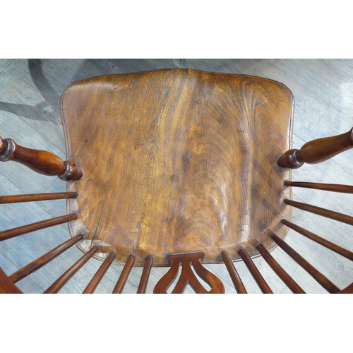 6173 - A 19th Century elm hoop back Windsor chair, H stretcher base