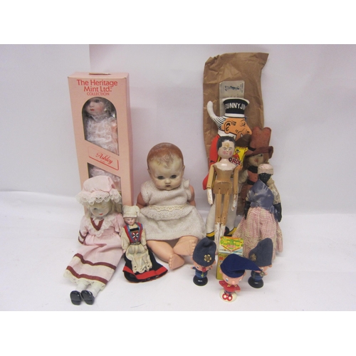 8305 - A collection of dolls and character toys to include painted wooden peg doll, Sunny Jim rag doll in o... 