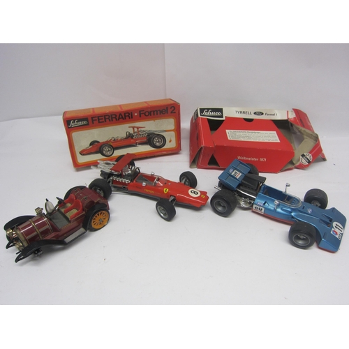 8245 - Two boxed Schuco racing cars to include 356 176 Tyrell Ford Formel 1 (box poor) and 1073 Ferrari For... 