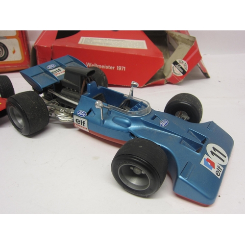 8245 - Two boxed Schuco racing cars to include 356 176 Tyrell Ford Formel 1 (box poor) and 1073 Ferrari For... 